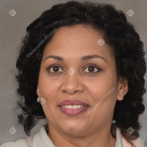 Joyful black adult female with medium  brown hair and brown eyes