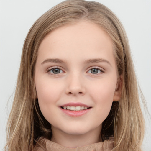 Joyful white child female with long  brown hair and brown eyes