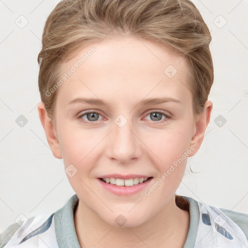 Joyful white young-adult female with short  brown hair and blue eyes