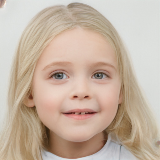 Joyful white child female with long  brown hair and blue eyes