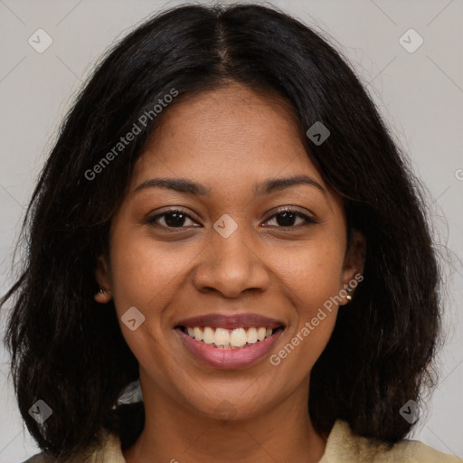 Joyful black young-adult female with medium  brown hair and brown eyes