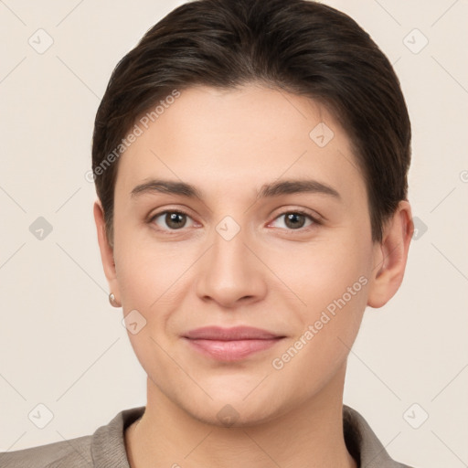 Joyful white young-adult female with short  brown hair and brown eyes