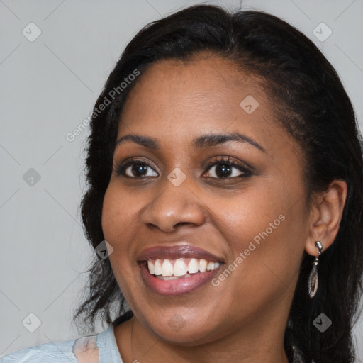 Joyful latino young-adult female with long  brown hair and brown eyes