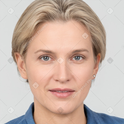 Joyful white adult female with short  brown hair and grey eyes