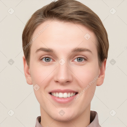 Joyful white young-adult female with short  brown hair and grey eyes