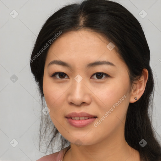 Joyful asian young-adult female with medium  brown hair and brown eyes