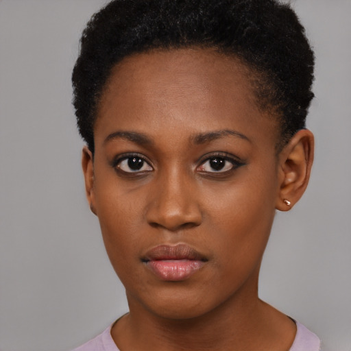 Neutral black young-adult female with short  brown hair and brown eyes