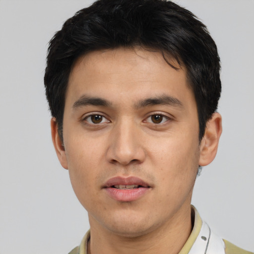 Neutral asian young-adult male with short  brown hair and brown eyes