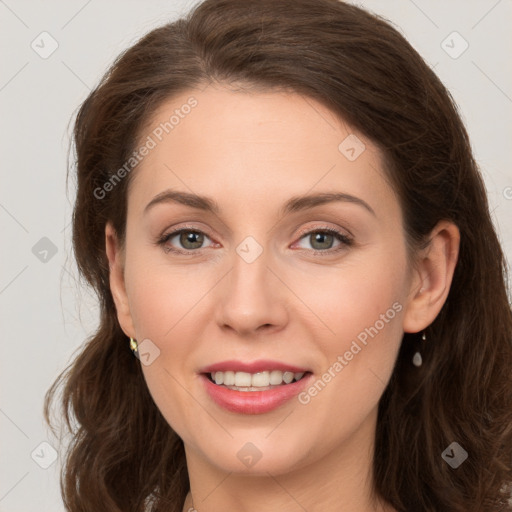 Joyful white young-adult female with long  brown hair and green eyes