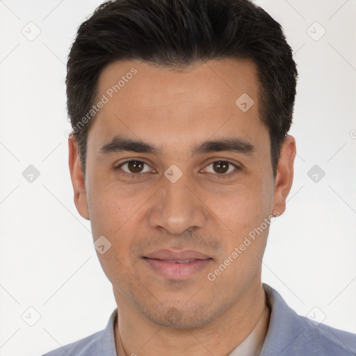 Joyful white young-adult male with short  brown hair and brown eyes