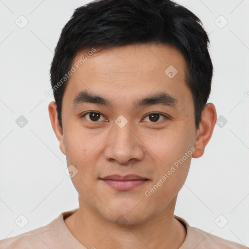 Joyful white young-adult male with short  black hair and brown eyes