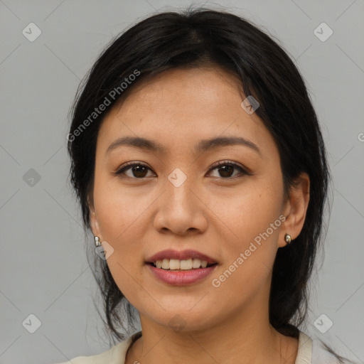 Joyful latino young-adult female with medium  brown hair and brown eyes