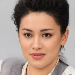 Joyful asian young-adult female with short  brown hair and brown eyes