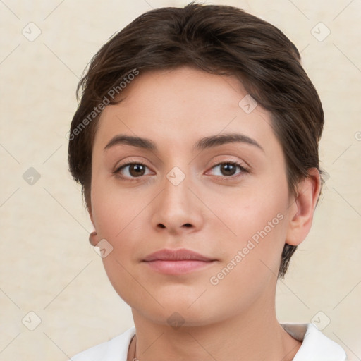 Neutral white young-adult female with short  brown hair and brown eyes