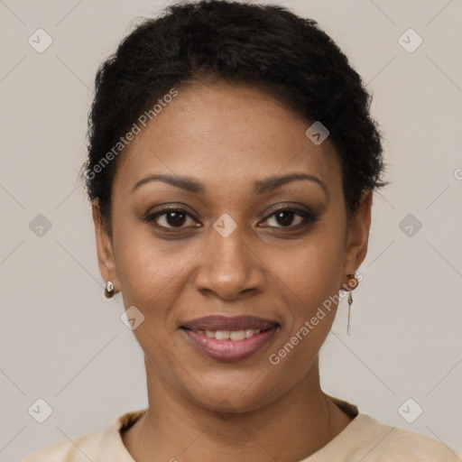 Joyful black young-adult female with short  brown hair and brown eyes