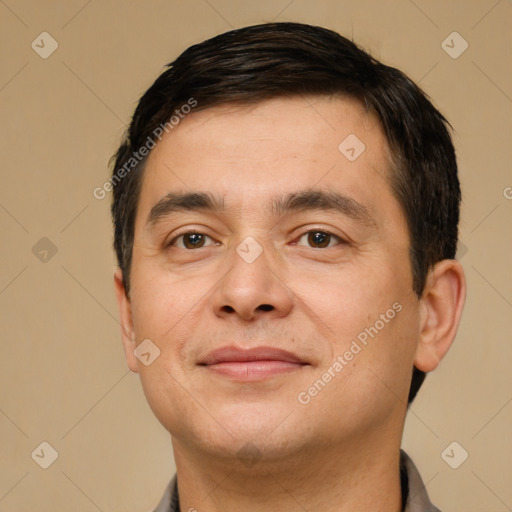 Joyful white young-adult male with short  brown hair and brown eyes