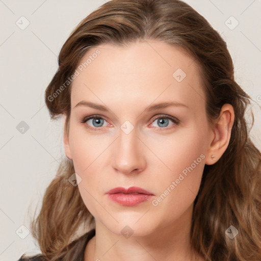 Neutral white young-adult female with long  brown hair and grey eyes