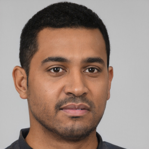 Neutral latino young-adult male with short  black hair and brown eyes
