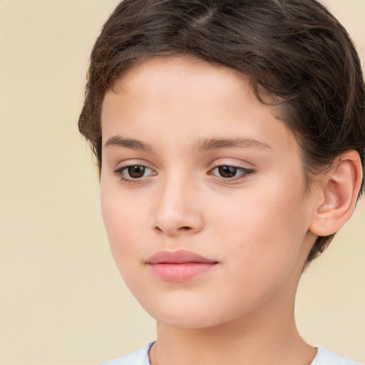 Joyful white child female with short  brown hair and brown eyes