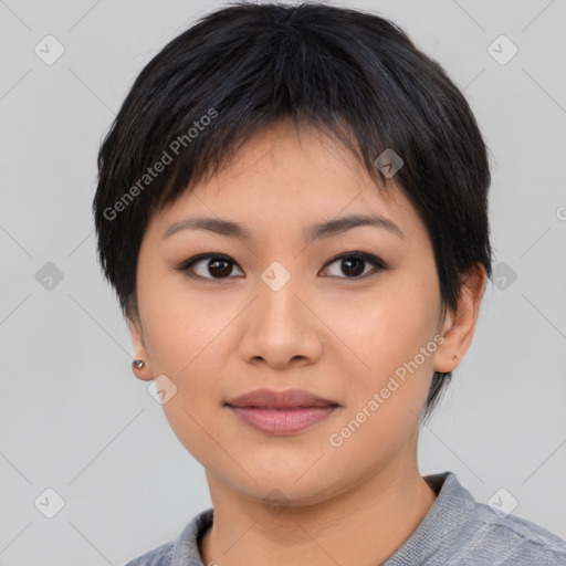 Joyful asian young-adult female with short  black hair and brown eyes