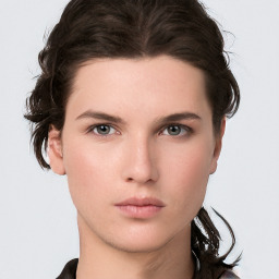 Neutral white young-adult female with short  brown hair and brown eyes