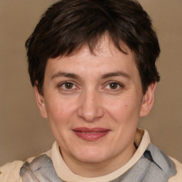 Joyful white adult female with short  brown hair and brown eyes