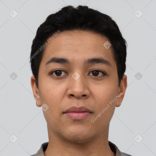 Neutral latino young-adult male with short  black hair and brown eyes