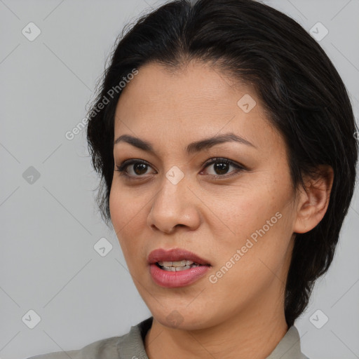 Joyful asian young-adult female with medium  brown hair and brown eyes