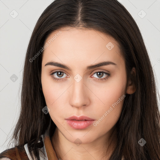 Neutral white young-adult female with long  brown hair and brown eyes