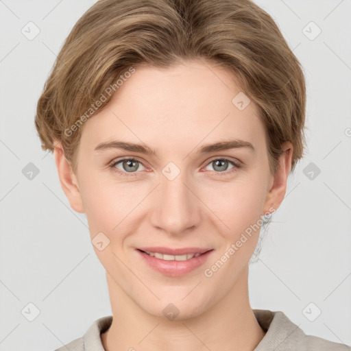 Joyful white young-adult female with short  brown hair and grey eyes