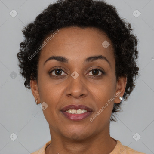 Joyful black young-adult female with short  brown hair and brown eyes