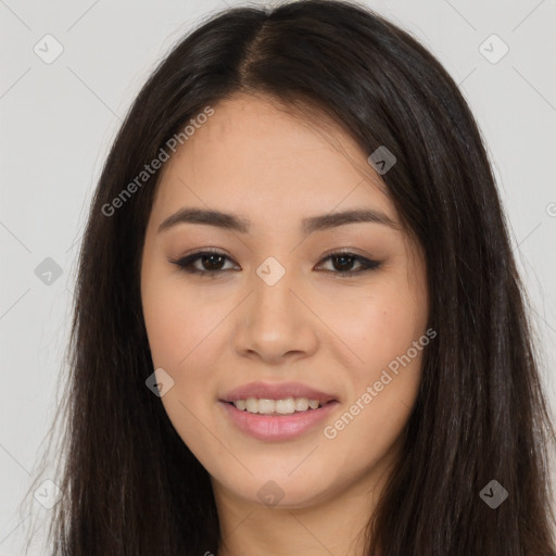 Joyful asian young-adult female with long  brown hair and brown eyes