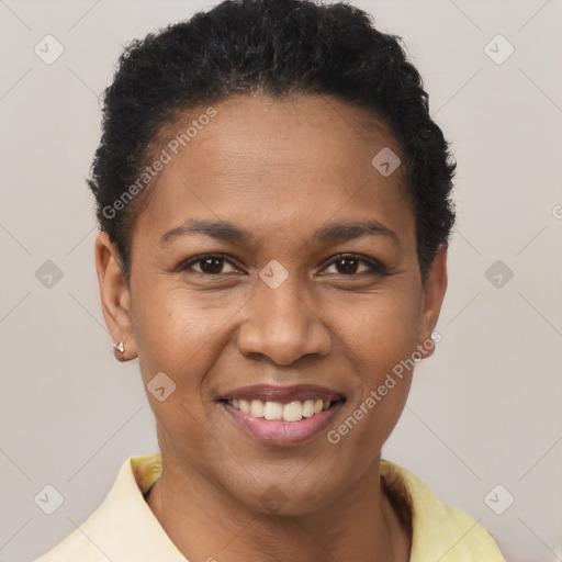 Joyful black young-adult female with short  brown hair and brown eyes