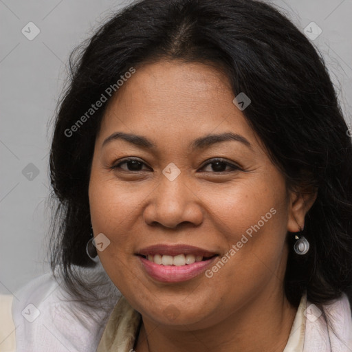 Joyful white adult female with long  brown hair and brown eyes