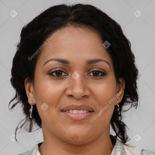 Joyful latino adult female with medium  brown hair and brown eyes