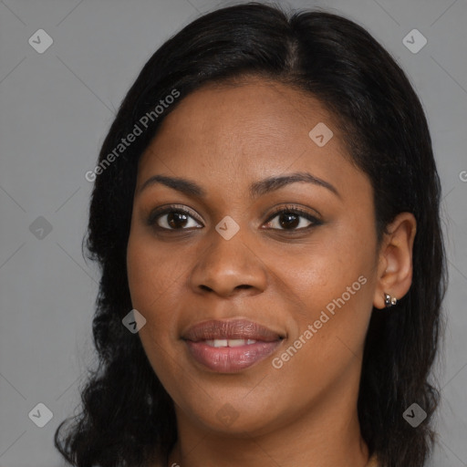 Joyful black young-adult female with long  brown hair and brown eyes