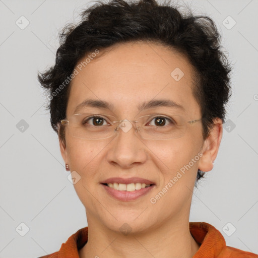 Joyful white adult female with short  brown hair and brown eyes