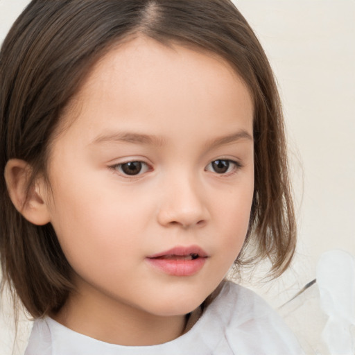 Neutral white child female with medium  brown hair and brown eyes