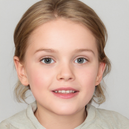 Joyful white child female with medium  brown hair and blue eyes