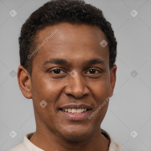 Joyful latino young-adult male with short  brown hair and brown eyes