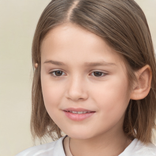 Joyful white child female with medium  brown hair and brown eyes