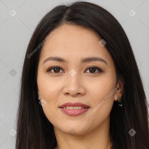 Joyful white young-adult female with long  brown hair and brown eyes