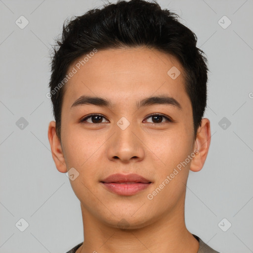 Joyful asian young-adult male with short  brown hair and brown eyes