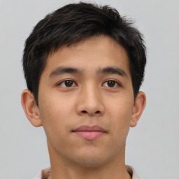 Neutral asian young-adult male with short  brown hair and brown eyes