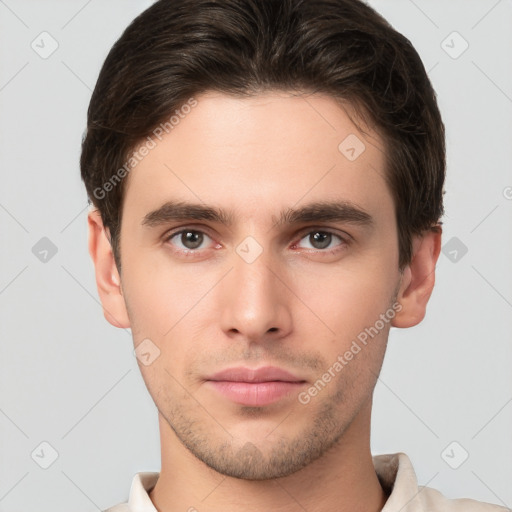 Neutral white young-adult male with short  brown hair and brown eyes