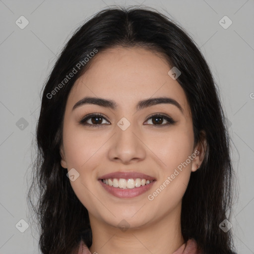 Joyful latino young-adult female with long  brown hair and brown eyes