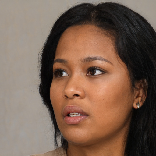 Neutral asian young-adult female with long  black hair and brown eyes