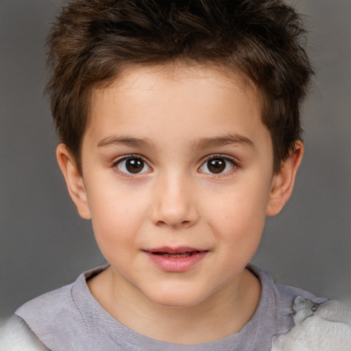 Joyful white child male with short  brown hair and brown eyes