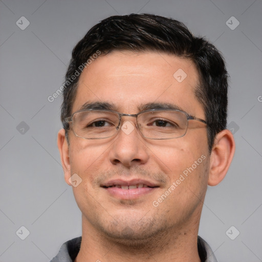 Joyful white adult male with short  brown hair and brown eyes