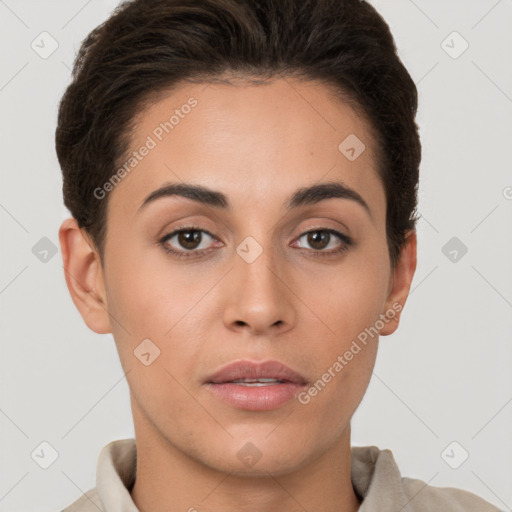 Joyful white young-adult female with short  brown hair and brown eyes